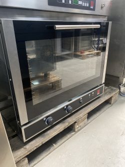 Built-in oven from EKA with knobs and hinge at the bottom, used